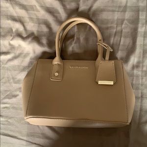 Tan Ny&Co purse. Brand new. Never worn